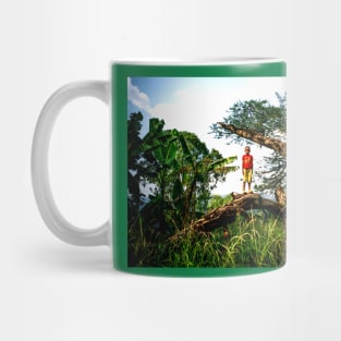 Boy on tree-amazing images Mug